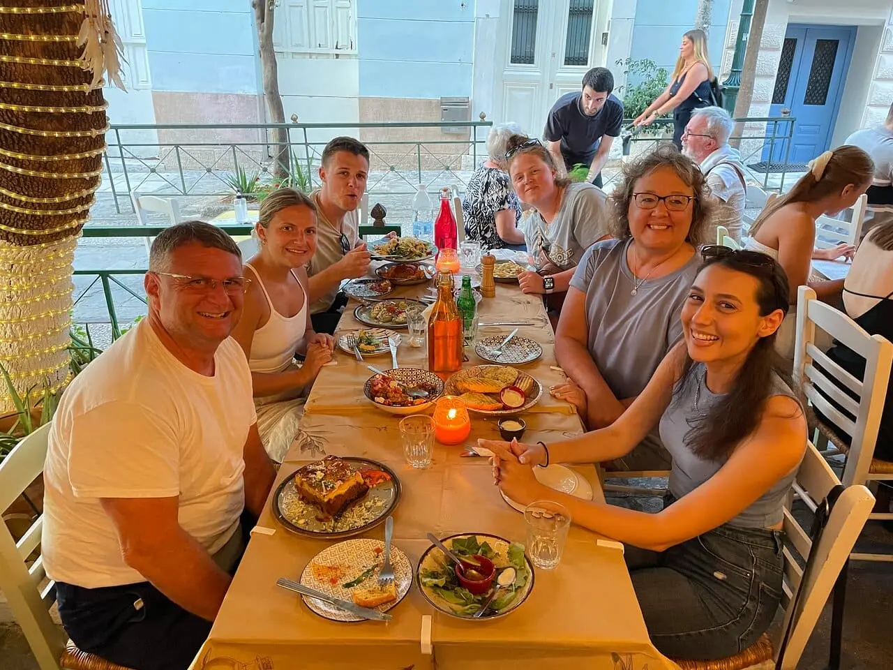 Athens at night with illuminated streets and restaurants